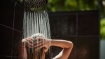 Taking cold showers may have benefits for your mental and cardiovascular health, experts say. (skynesher / E+)