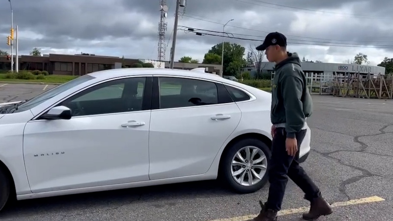 Joshua Kim walks to his rental vehicle on July 25, 2024 (Joshua Kim/ handout)