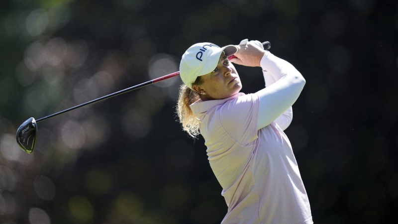 Lauren Coughlin plays on the fourth hole during the last round of the Evian Championship women's golf tournament, in Evian, eastern France, on July 14, 2024. (AP Photo/Laurent Cipriani)