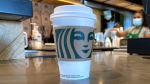 The Starbucks logo is displayed on a cup at a Starbucks store in October 2021 in Marin City, Calif. (Justin Sullivan/Getty Images via CNN Newsource)