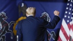 Republican presidential candidate former U.S. president Donald Trump gestures as he walks off stage after speaking at a campaign rally in Harrisburg, Pa., July 31, 2024. (AP Photo/Matt Rourke)
