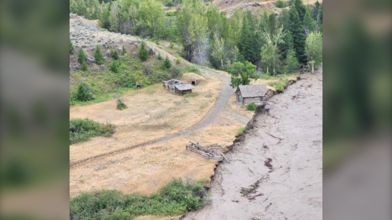 A cabin hangs precariously over the Chilcotin River in an image provided by the Tŝilhqot’in National Government. 