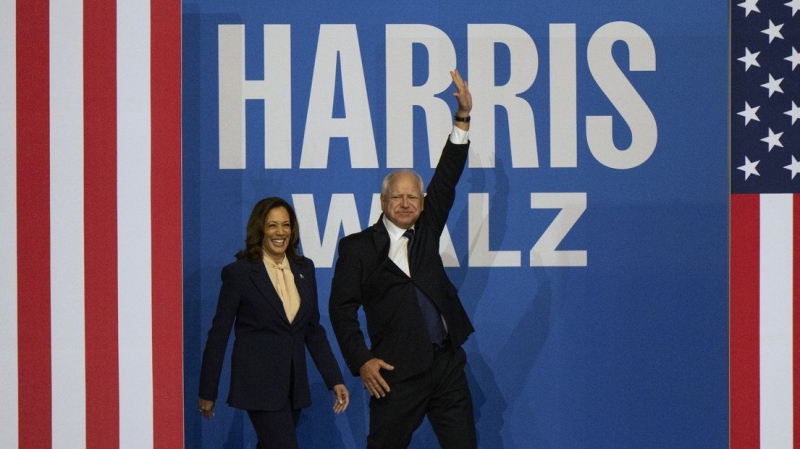 Democratic presidential nominee Vice President Kamala Harris and her running mate Minnesota Gov. Tim Walz arrive for a campaign rally in Philadelphia, Tuesday, Aug. 6, 2024. (Joe Lamberti/AP Photo)