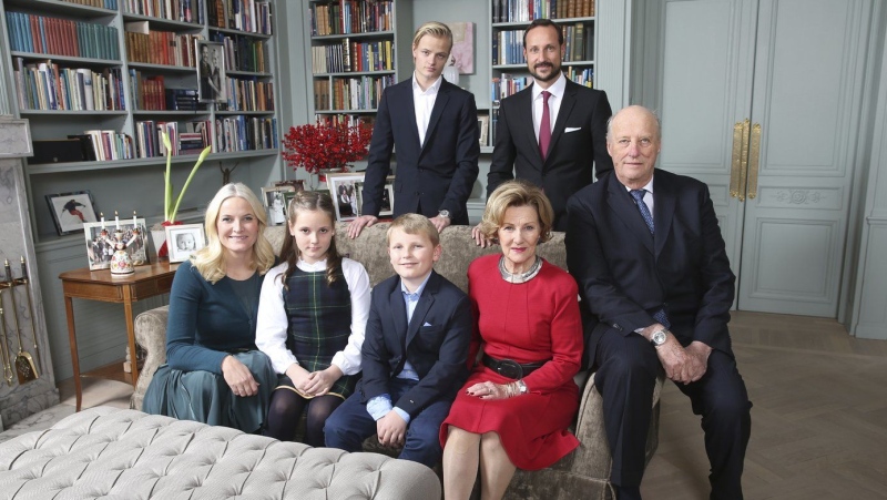 Back row from left, Marius Borg Hoiby and Crown Prince Haakon, front row from left, Crown Princess Mette-Marit, Princess Ingrid Alexandra, Prince Sverre Magnus, Queen Sonja and King Harald pose during a Christmas photo session in Asker, Norway, Monday, Dec. 14, 2015. (Lise Aaserud/Pool Photo via AP)