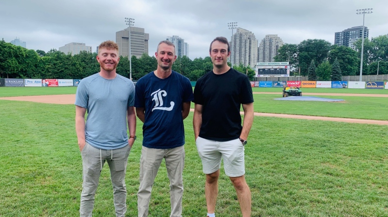 Left to right: Braeden Ferrington, Mark Drewe and Owen Boon inside Labatt Park in London, Ont. (Reta Ismail/CTV News London)