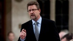 Minister of Transport, Infrastructure and Communities Chuck Strahl responds to a question during question period in the House of Commons on Parliament Hill in Ottawa on Thursday Sept. 23, 2010. (Sean Kilpatrick / The Canadian Press)