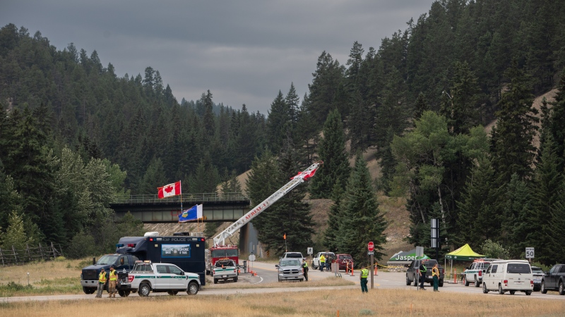 A checkpoint for returning residents on the edge of Jasper, Alta., on Friday, Aug. 16, 2024. Wildfire caused evacuations and widespread damage in the National Park and Jasper townsite. (Amber Bracken / The Canadian Press) 