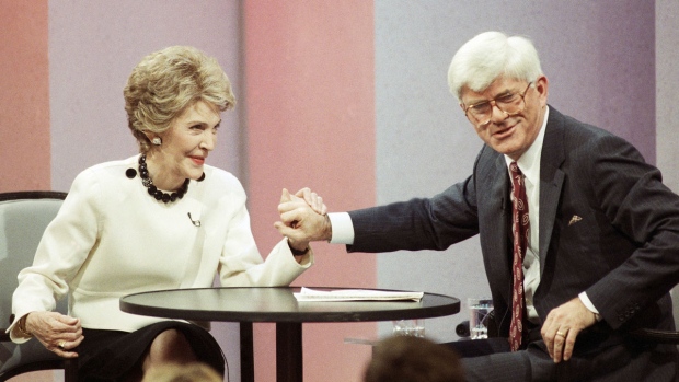 Talk show host Phil Donahue appears with former first lady Nancy Reagan during taping of his show to promote her book "My Turn" on Nov. 6, 1989, in Burbank, Calif. Donahue, whose pioneering daytime talk show launched an indelible television genre, has died. He was 88. (AP Photo/Bob Galbraith, File)