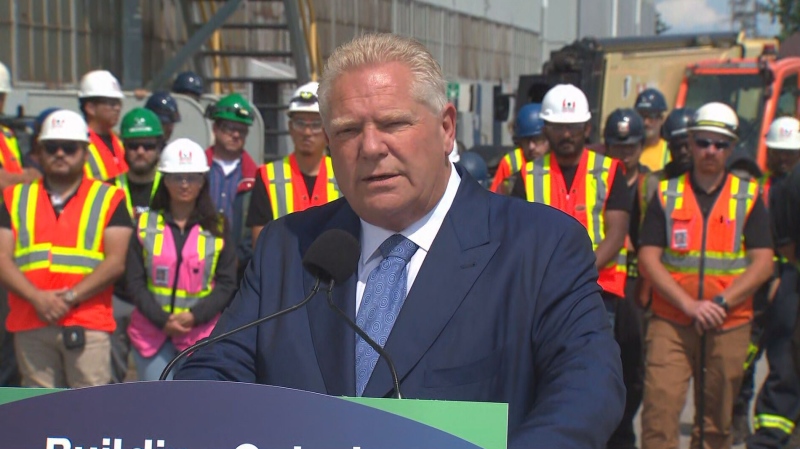 Ontario Premier Doug Ford answers questions from reporters following an Aug. 21 news conference in St. Catharine's.