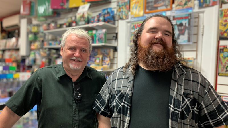 John Brenner and Jacob Brenner posed for a photo inside the Lookin' For Heroes store in Kitchener on Sept. 6, 2024. (Colton Wiens/CTV News)