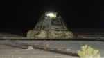 The empty Boeing Starliner capsule sits at White Sands Missile Range in New Mexico, late Friday, Sept. 6, 2024, after undocking from the International Space Station. (Boeing via AP)