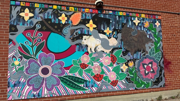 A new mural showcasing diversity and youth was unveiled in North Central community on Saturday. (Angela Stewart / CTV News) 