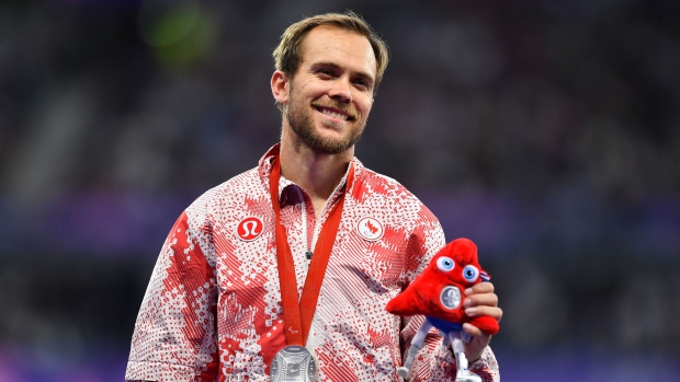 Silver medalist Nate Riech of Team Canada poses for a photo during a medal ceremony for the Men's 1500m-T38 Final on September 07, 2024 in Paris, France. (Photo by Franco Arland/Getty Images for IPC)