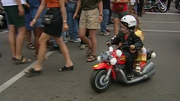 Two young motorcyclist hit the streets for Friday the 13th in Port Dover in 2001. 