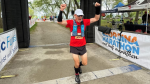 Dana Fox crosses the finish line at the Georgina Marathon. (Courtesy: Mike Anderson, Georgina Post)