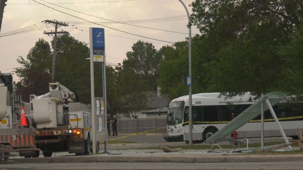 A damaged bus shelter is seen at Portage Avenue and Bedson Street following a fatal crash in Winnipeg on Sept. 13, 2024.(Joseph Bernacki/CTV News Winnipeg)