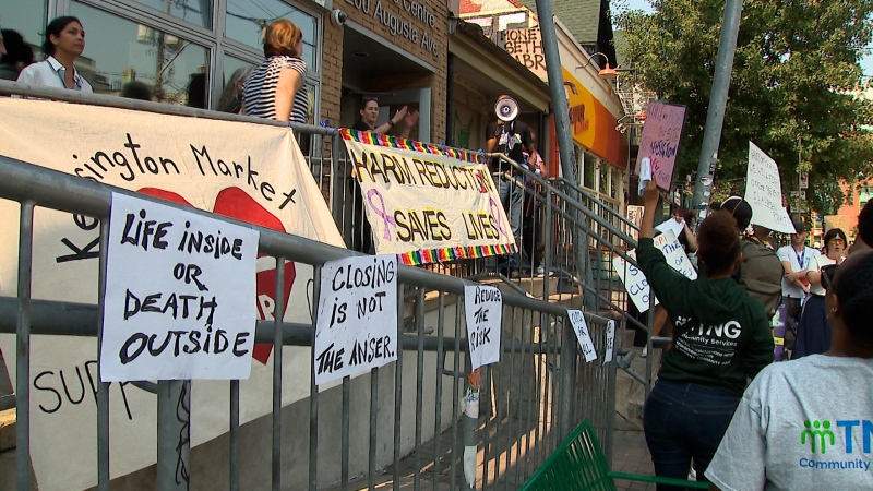 A rally is held outside the Kensington Market supervised consumption site on Friday, Sept. 13, 2024. (Jon Woodward/CTV News Toronto)