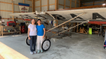 Roberta Lau and Evelyn Sue Wong with their father's Sky Scout plane in Guelph, Ont. on Sept. 13, 2024. (Krista Simpson/CTV News)