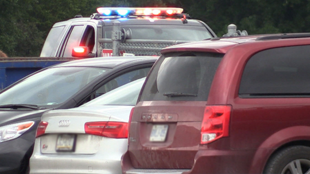 A police vehicle attends a parking lot in Orillia, Ont. (CTV News)