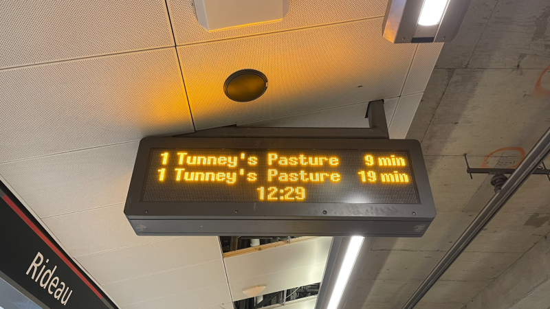 A sign at Rideau Station showing the next two LRT trains headed to Tunney's Pasture, set to arrive in 9 minutes and 19 minutes, respectively. Sept. 18, 2024. (Ted Raymond/CTV News Ottawa)