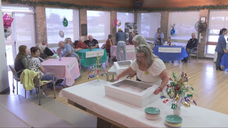 Eight centenarian residents of Park Manor Care Home in Transcona are pictured during a joint birthday party on Sept. 18, 2024. (Jamie Dowsett/CTV News Winnipeg)