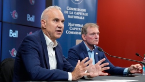 President and CEO of the Ottawa Senators Cyril Leeder (right) looks on as Chief Executive Officer of the National Capital Commission Tobi Nussbaum speaks
during a news conference, Friday, Sept. 20, 2024 in Ottawa. The Senators and the National Capital Commission have reached an agreement in principle to build a new arena in downtown Ottawa. (Adrian Wyld/THE CANADIAN PRESS)