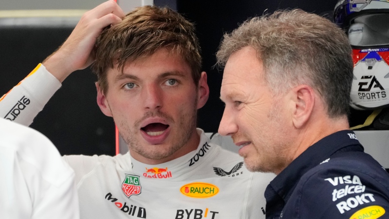 Red Bull driver Max Verstappen, left, during the second practice session of the Singapore Formula One Grand Prix at the Marina Bay Street Circuit, in Singapore, Friday, Sept. 20, 2024. (Vincent Thian / AP Photo)