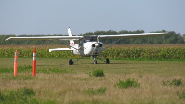 A plane is seen on the grass runway at Harv's Air School just south of Steinbach on Sept. 20, 2024. (Jeff Keele/CTV News Winnipeg)