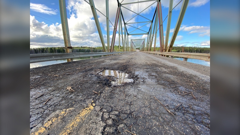 A pothole is seen on the bridge over the Churchill River near Lynn Lake, Man. Uploaded Sept. 23, 2024. (Jenna Dulewich)