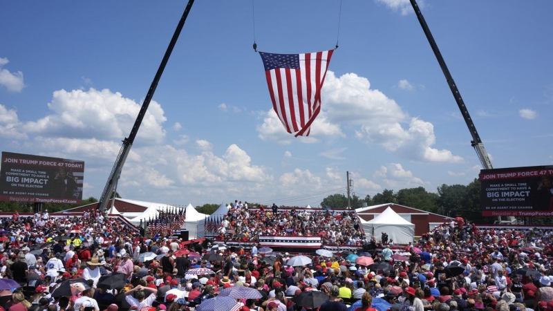 A crowd waits for Republican presidential candidate former President Donald Trump to speak at a campaign event in Butler, Pa., July 13, 2024. (AP Photo/Gene J. Puskar, File)