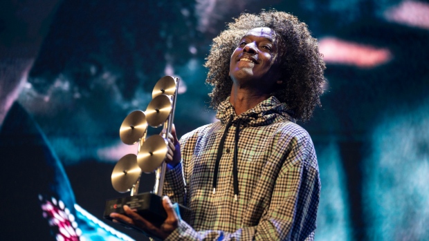 K'naan receives the Cultural Impact Award for his song "Wavin' Flag" at the 34th SOCAN Awards in Toronto, on Tuesday, September 24, 2024. THE CANADIAN PRESS/Paige Taylor White