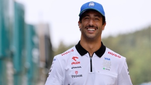 RB driver Daniel Ricciardo of Australia arrives in the paddock ahead of the Formula One Grand Prix at the Spa-Francorchamps racetrack in Spa, Belgium, Thursday, July 25, 2024. (Geert Vanden Wijngaert / AP Photo)