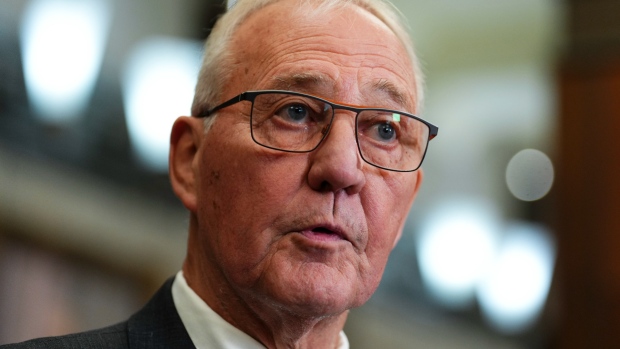 National Defence Minister Bill Blair makes his way to speak to reporters in the foyer of the House of Commons on Parliament Hill in Ottawa, Sept. 16, 2024. THE CANADIAN PRESS/Sean Kilpatrick