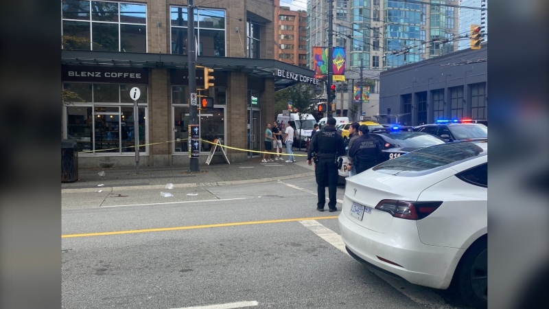 Images from the scene show police tape up along the sidewalk on the west side of the street, with multiple officers and police vehicles responding. (CTV News)