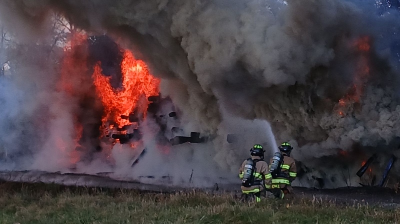 Firefighters battle a railroad tie tire in St. Thomas, Thursday, October 10, 2024 (Source: St. Thomas Fire Department)