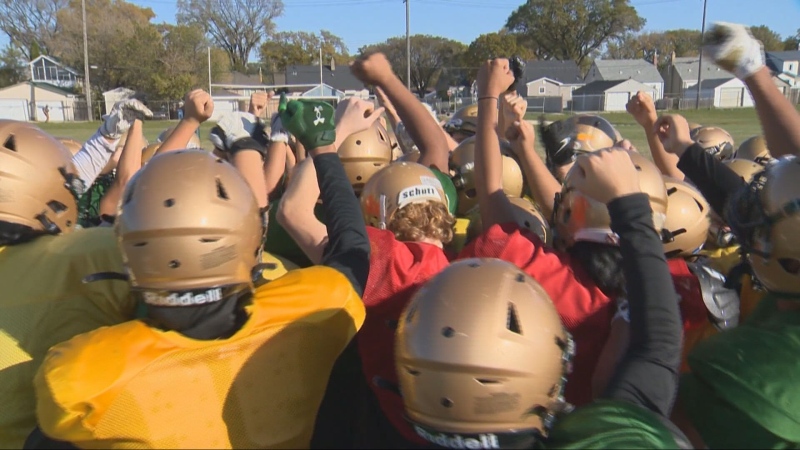 The Tec Voc Hornets huddle up at practice on Oct. 8, 2024. (Scott Andersson/CTV News Winnipeg)