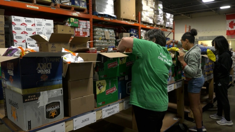 Volunteers sort donations at the London Food Bank for the 36th annual Thanksgiving Food Drive. (Nick Paparella/CTV London)