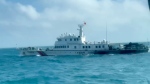 In this screen grab from video released by the Taiwan Coast Guard, a view of a China Coast Guard boat from a Taiwan Coast Guard boat as it passes near the coast of Matsu islands, Taiwan on Monday, Oct. 14, 2024. (Taiwan Coast Guard via AP) 