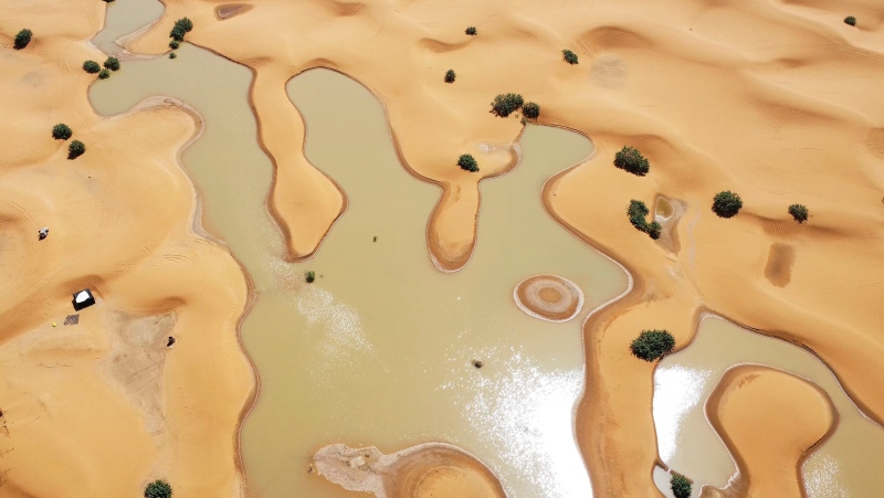 A view of lakes caused by heavy rainfall between sand dunes are pictured in the desert town of Merzouga, near Rachidia, southeastern Morocco on October 2. AP via CNN Newsource