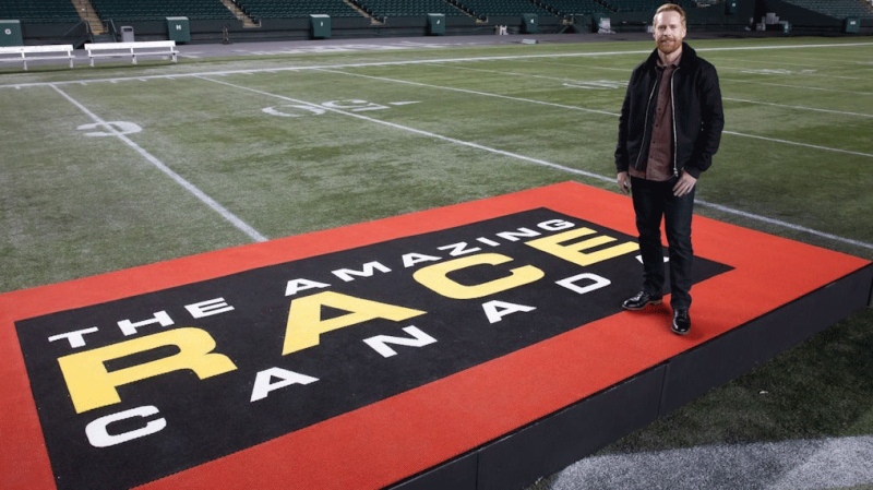 Amazing Race Canada host Jon Montgomery poses during filming of season 10 of the competition reality series. (CTV) 