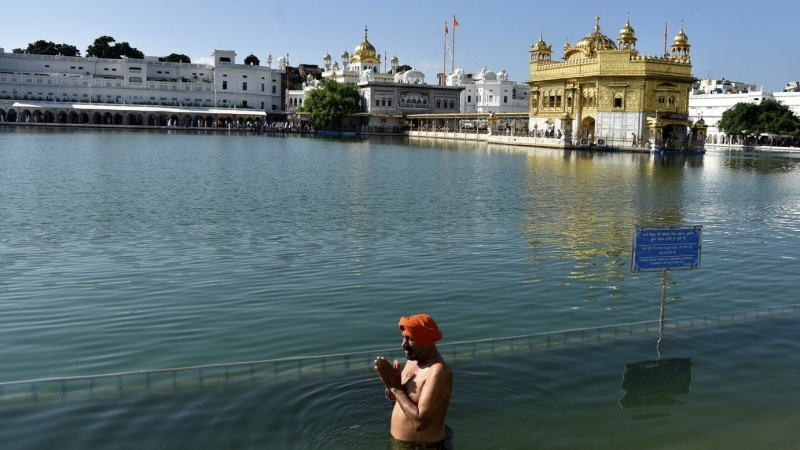 A Sikh devotee prays at the Golden Temple, Sikhism's holiest shrine, in Amritsar, India, Sept. 20, 2023. (AP Photo/Prabhjot Gill)