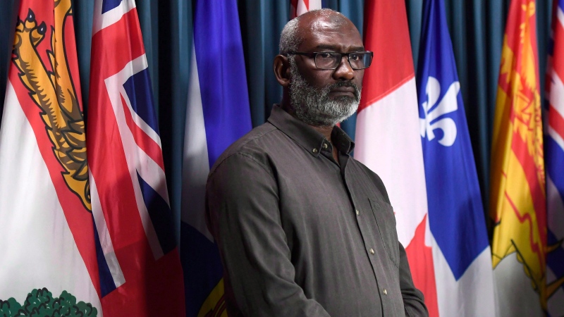 Abousfian Abdelrazik, a Canadian citizen who was detained in Sudan, looks on during a press conference on developments in his civil court case against the federal government, on Parliament Hill in Ottawa on Friday, Sept. 14, 2018. (THE CANADIAN PRESS/Justin Tang)