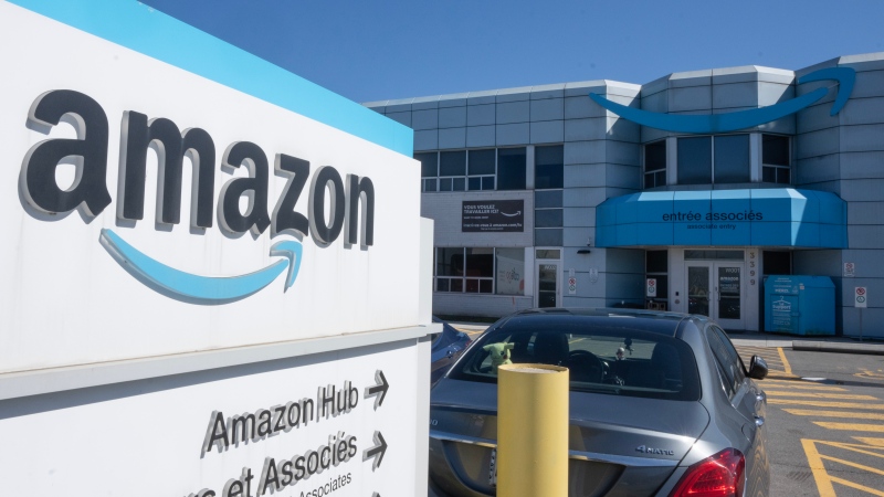 A Quebec-based union says it has filed an application to represent hundreds of Amazon workers at a warehouse in the province. The Amazon DXT4 warehouse is seen in Laval, Que., Monday, April 22, 2024. THE CANADIAN PRESS/Ryan Remiorz