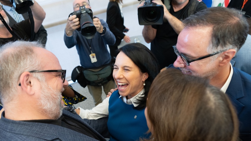 Montreal mayor Valérie Plante greets her party colleagues after an announcement to media that she will not run for a third term in next year's municipal elections in Montreal, Wednesday. THE CANADIAN PRESS/Christinne Muschi
