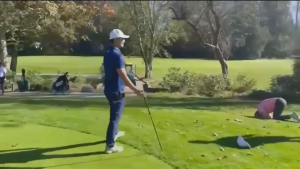 A screenshot of a video shows a fight on a North Burnaby golf course. One man allegedly hit three others with his driver. 