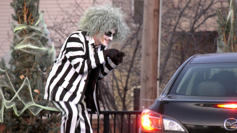 Professional actor Noah Sharon is seen dressed as Beetlejuice at Calgary's Mint Smartwash, which has been transformed into the Monster Wash leading up to Halloween.