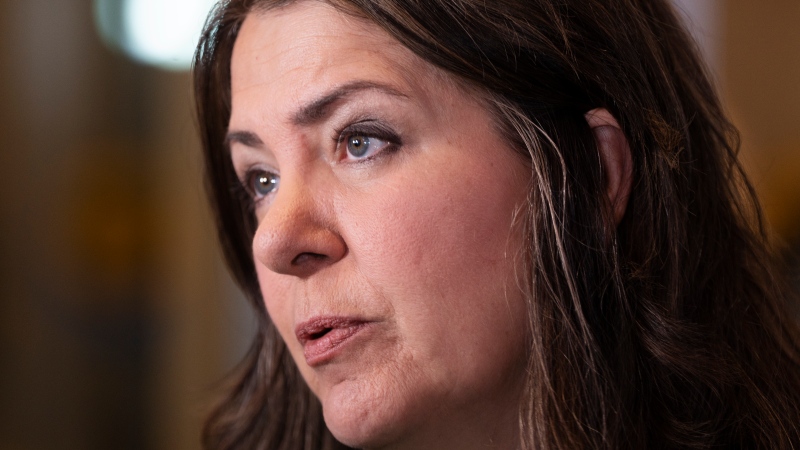 Alberta Premier Danielle Smith speaks with reporters before a meeting between Canada's premiers and Indigenous leaders at the Council of the Federation meetings in Halifax on Monday, July 15, 2024. (Darren Calabrese / The Canadian Press) 