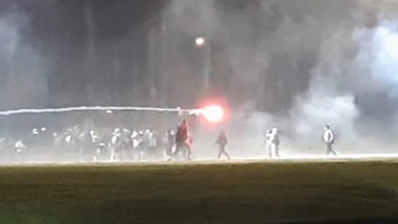 FILE: Teenagers gather at an outdoor Halloween party in Delta, B.C., in October 2022. 