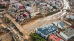 Mud covers the area in the aftermath of a storm that left hundreds dead or missing in the region, in Paiporta, outskirts of Valencia, Spain, Saturday, Nov. 2, 2024.(AP Photo/Angel Garcia)