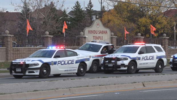 Peel Regional Police officers are standing outside of the Hindu Sabha Mandir in Brampton on Sunday, Nov. 3, 2024. (Jacob Estrin/CTV News Toronto)